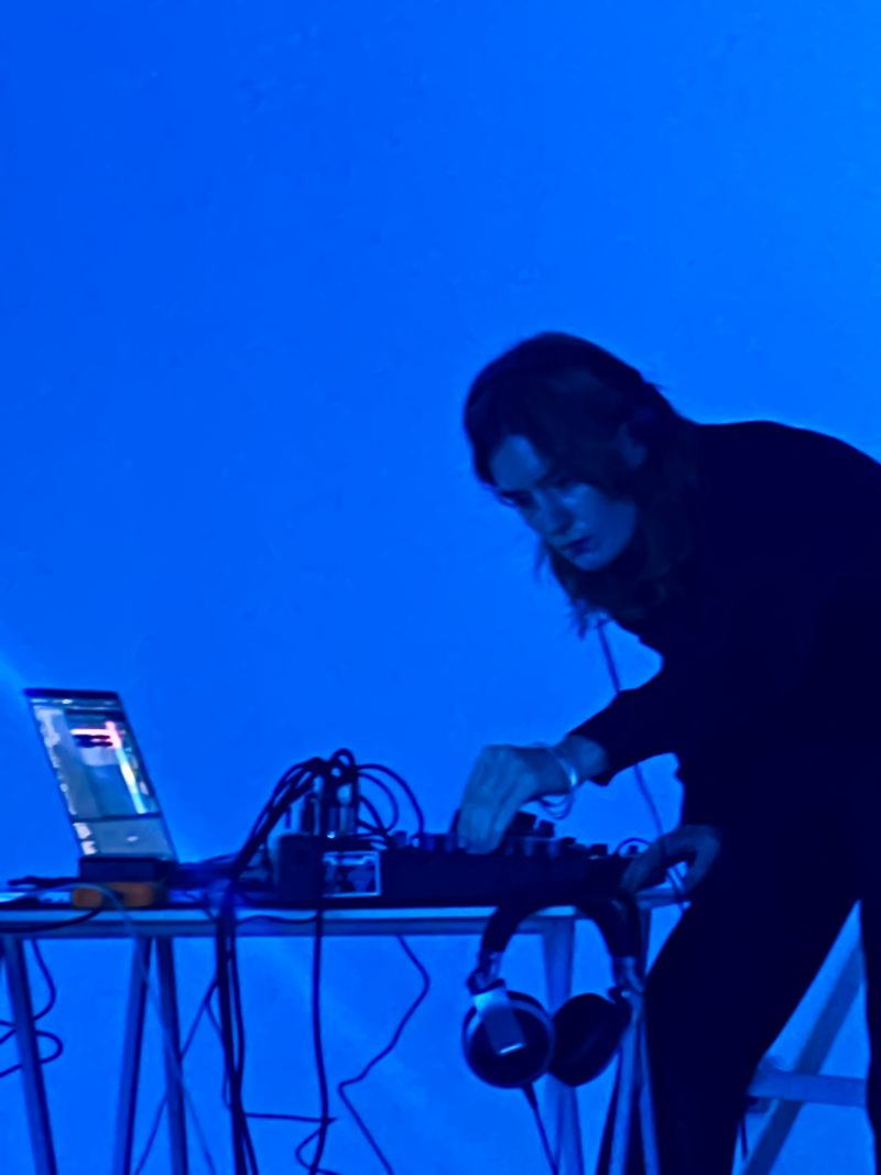 Image of Anna Clegg DJing during love letters event